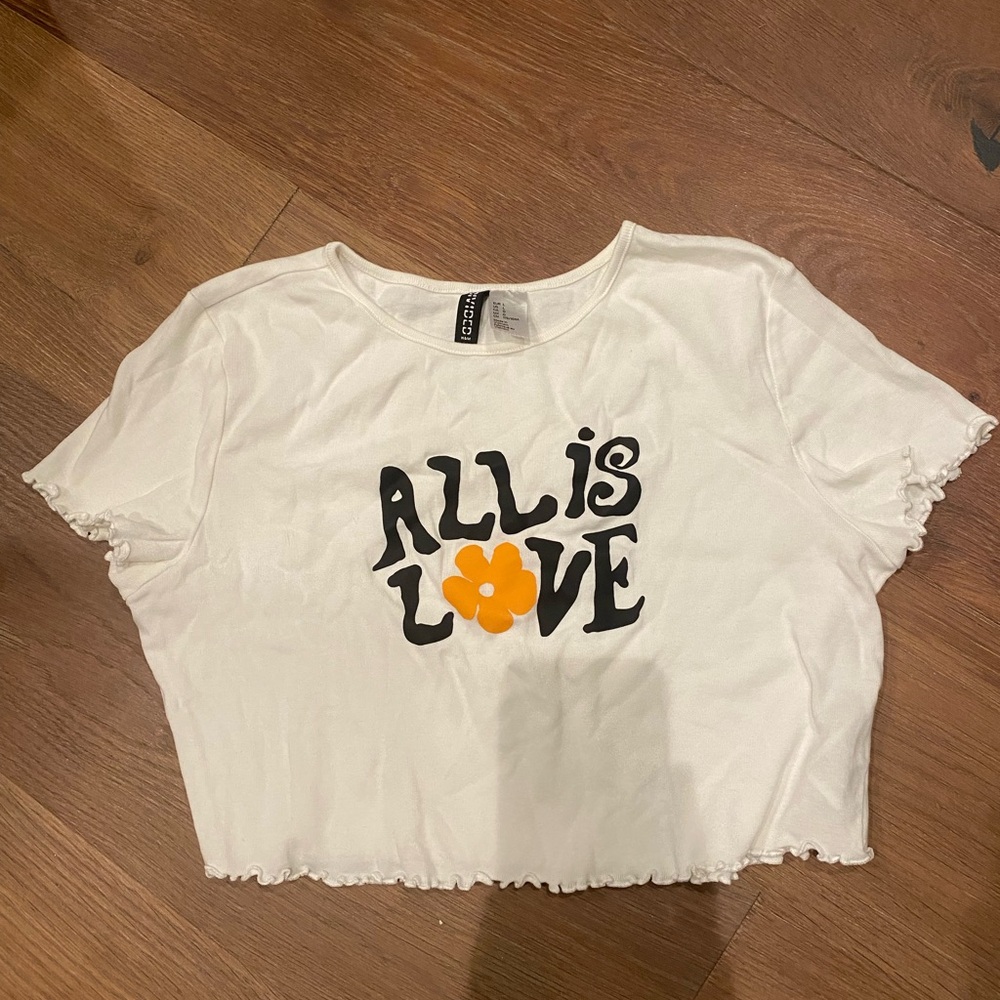 All you need is love women’s baby tee